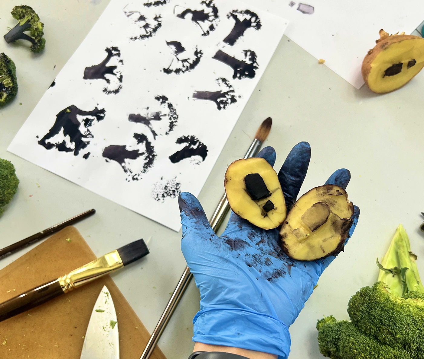 Potato and bread stamps used to print the illustrations